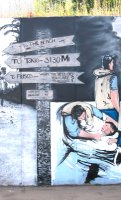 Remembrance Wall (World War II Mural): To the Beach -- To Tokio 3130 Mi -- To Frisco -- What the hell do you care? Your not going there -- Golden Gate 48' -- Breadline 49'